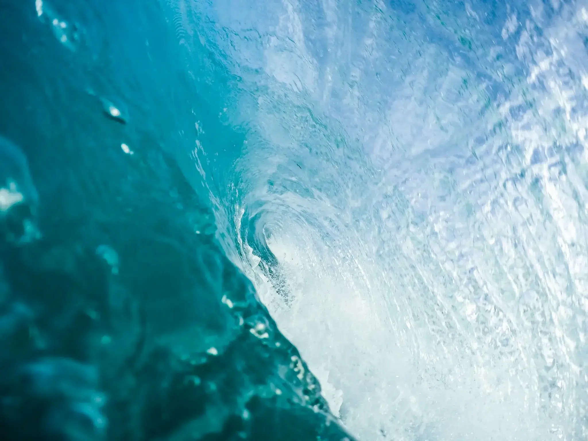 Breathwave case study hero image: aqua swirl underwater