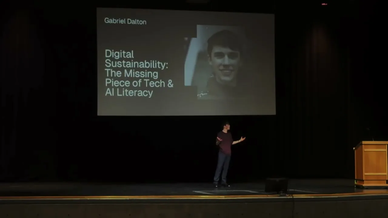 Gabriel Dalton on stage at TEDxEcole Mission Secondary presenting Digital Sustainability: The Missing Piece of Tech and AI Literacy